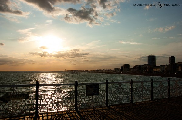 sunset blue sky Brighton Pier view skyline horizon orange clouds coast coastal city