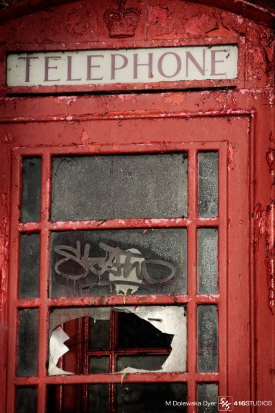 vandalised red phone booth