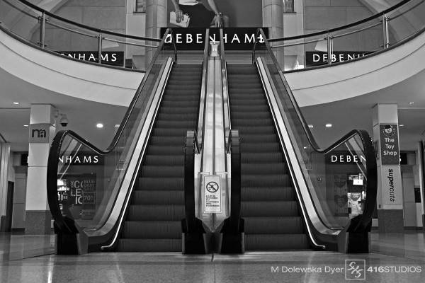 Symmetry - Escalators symmetry in photography black & white staircase stairs